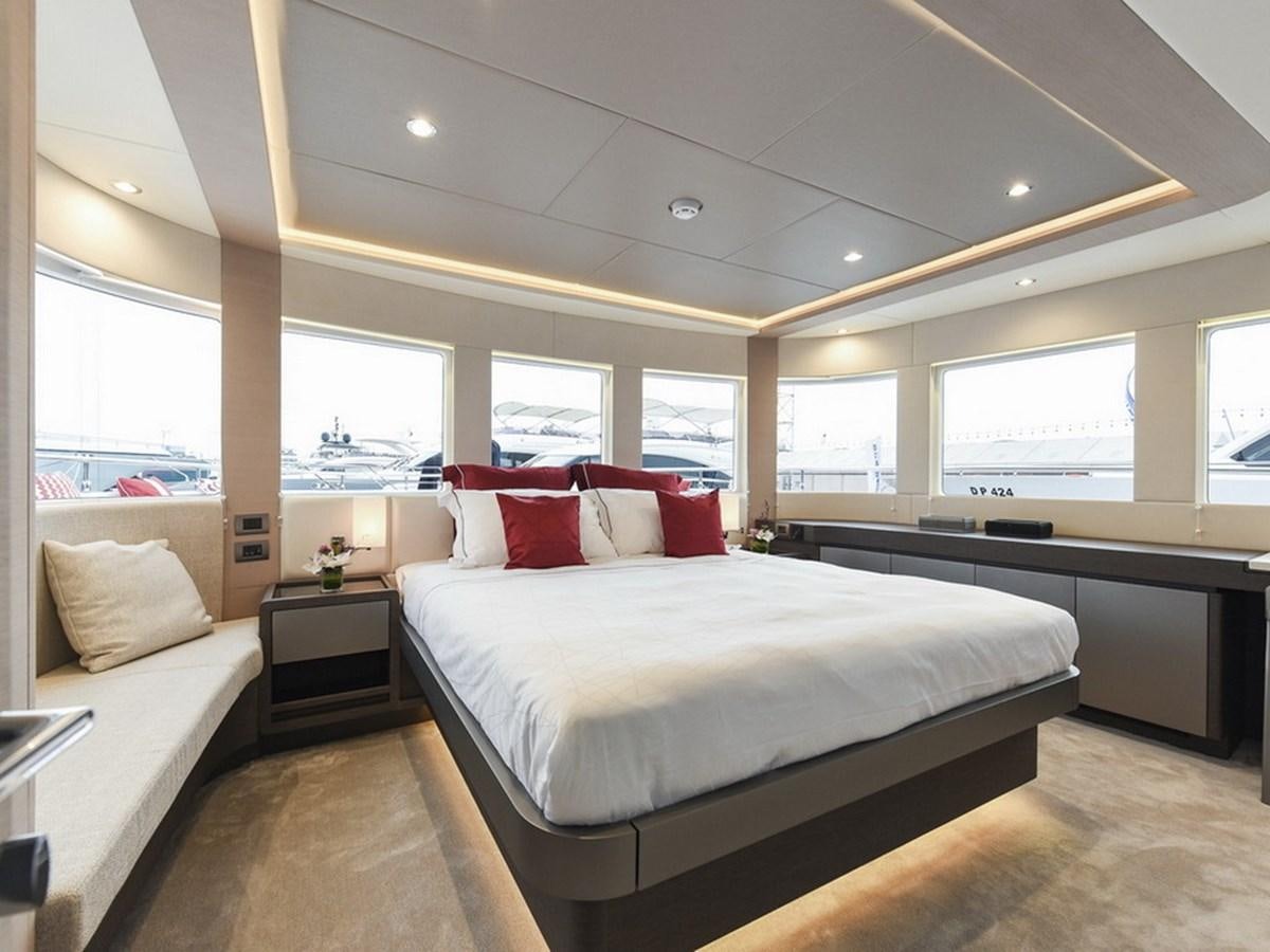 a room with a bed and a window aboard SG Yacht for Sale