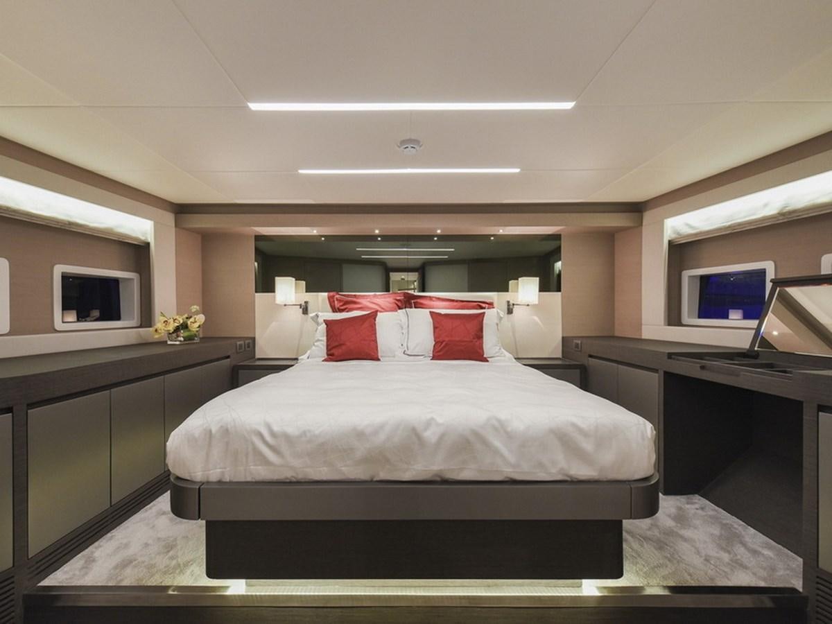 a bed in a room aboard SG Yacht for Sale