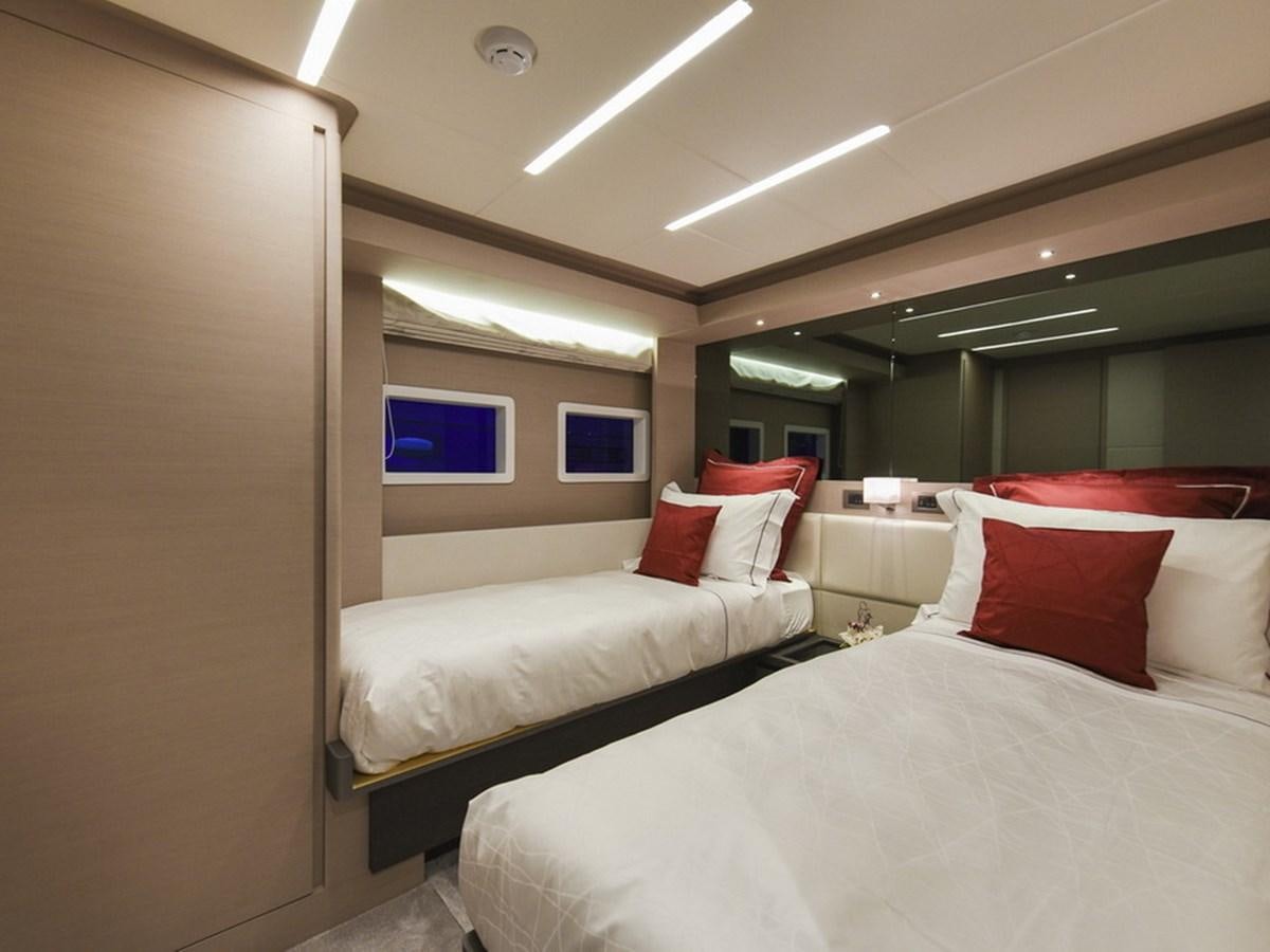 a room with two beds aboard SG Yacht for Sale