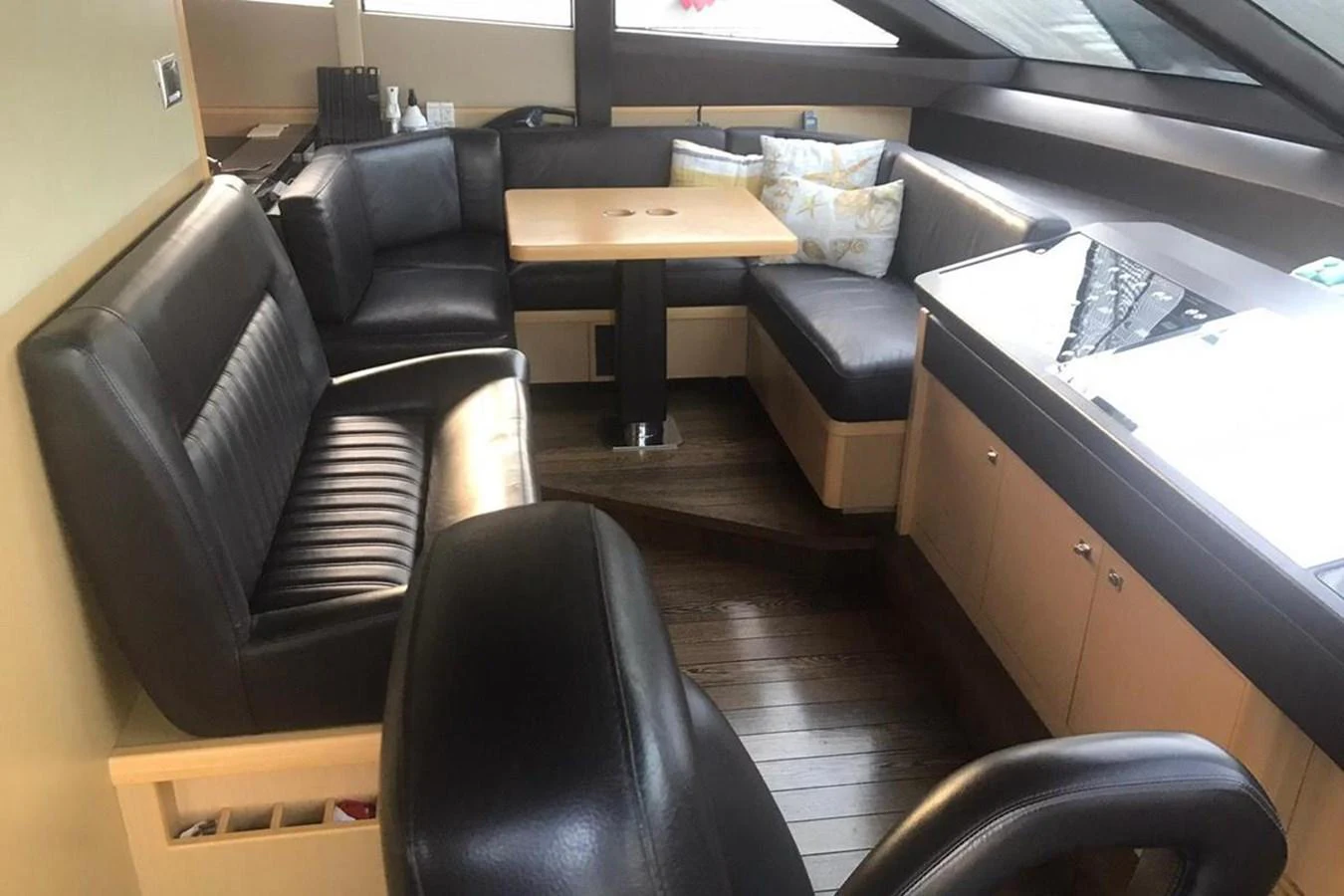 a room with a desk and chairs aboard PRINCESS I Yacht for Sale