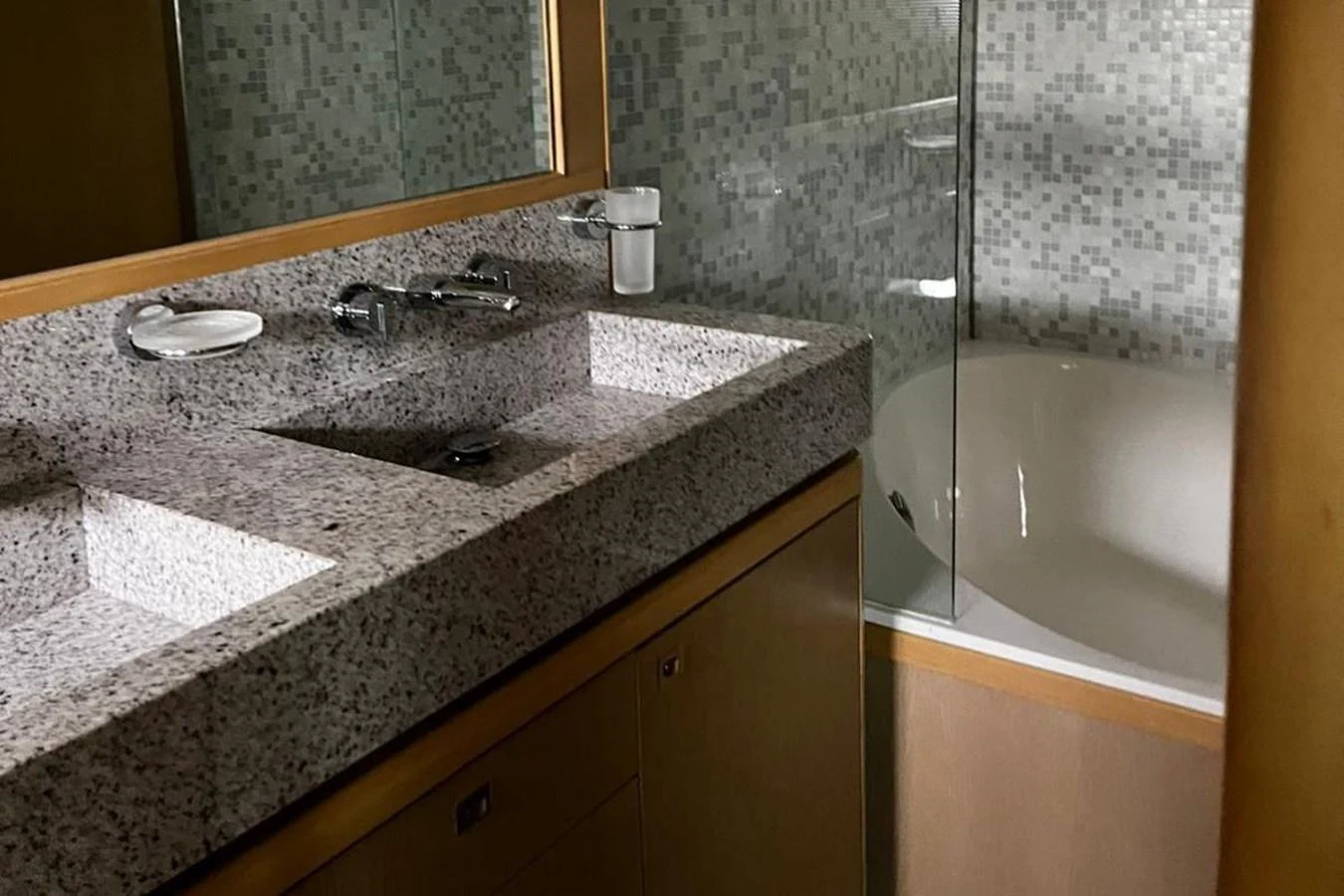 a bathroom with a marble counter top aboard PRINCESS I Yacht for Sale