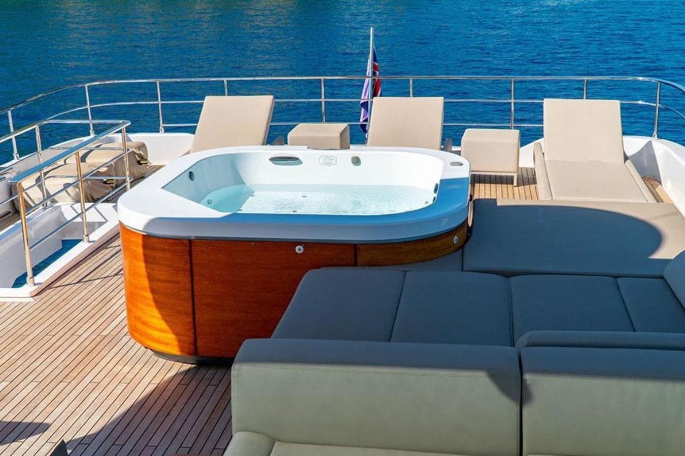 a boat on a deck aboard CUSTOM LINE  97 Yacht for Sale