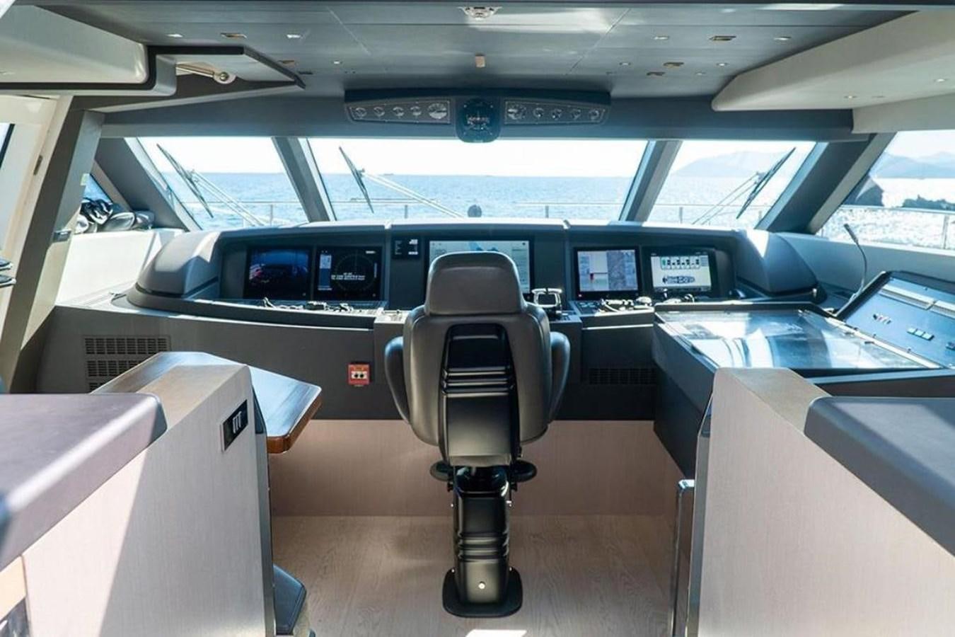 a vehicle with a seat and a seat belt aboard CUSTOM LINE  97 Yacht for Sale