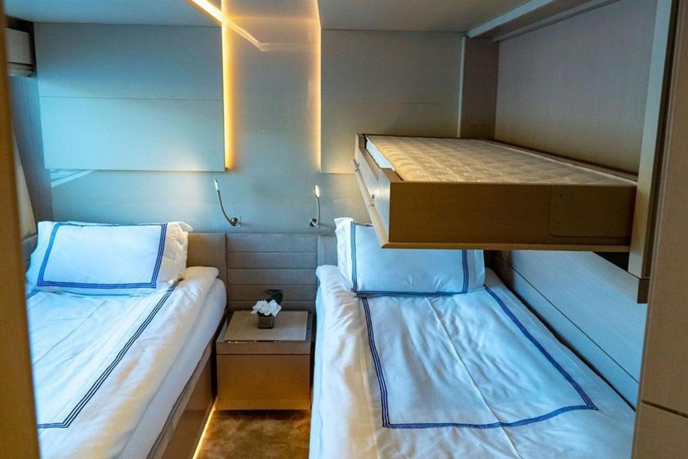 a room with two beds aboard CUSTOM LINE  97 Yacht for Sale