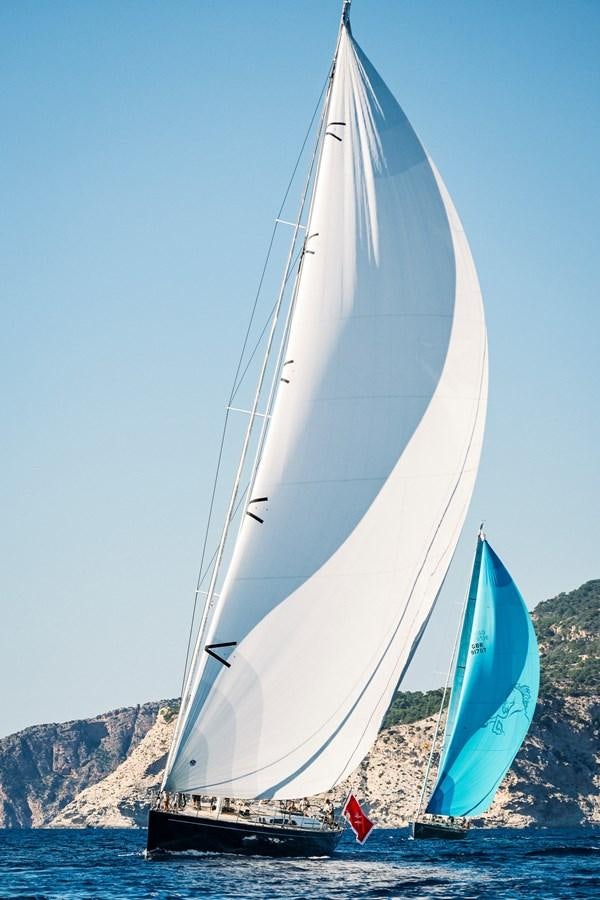 a couple of sailboats on the water aboard FRIDAY Yacht for Sale