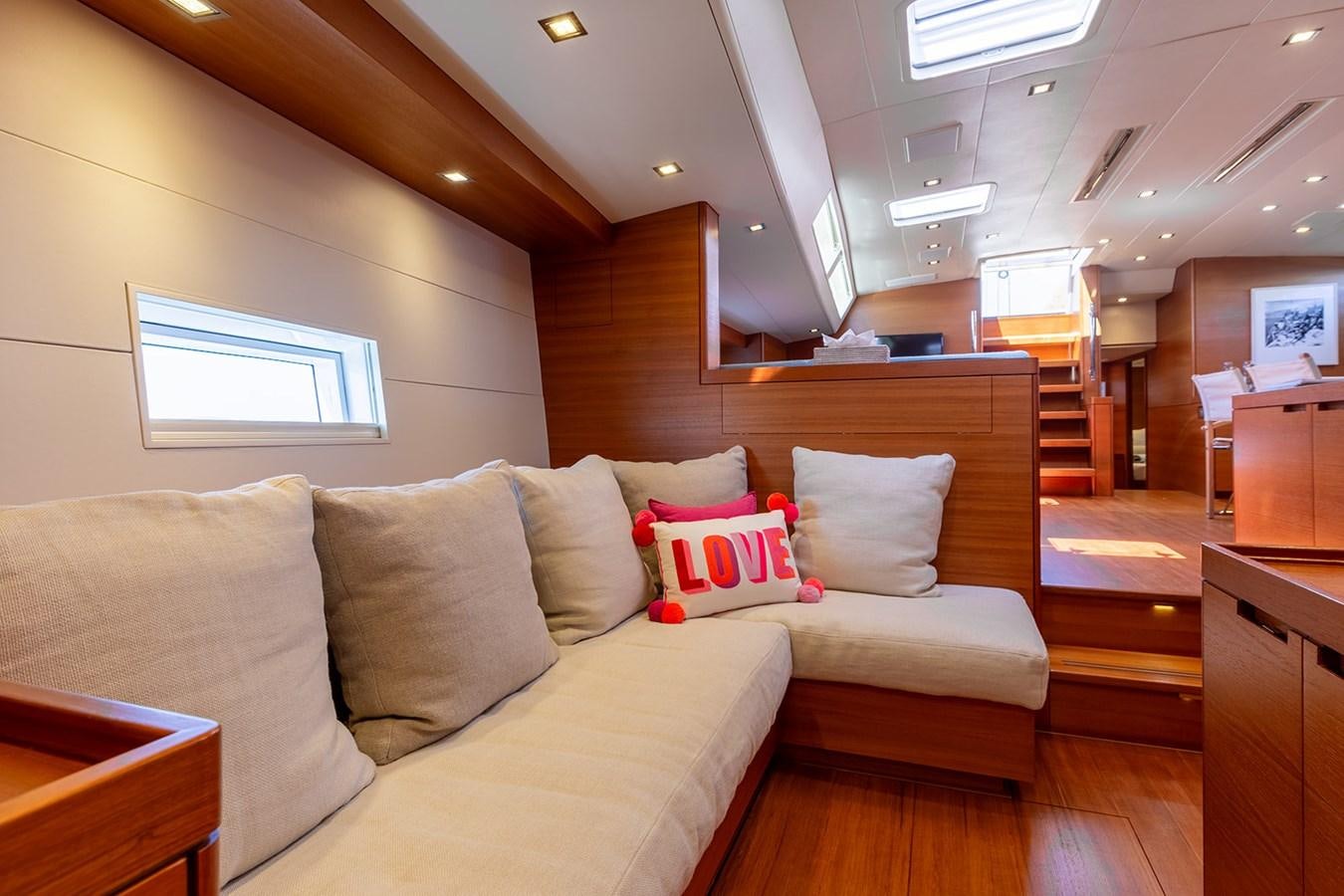 a couch in a room aboard FRIDAY Yacht for Sale