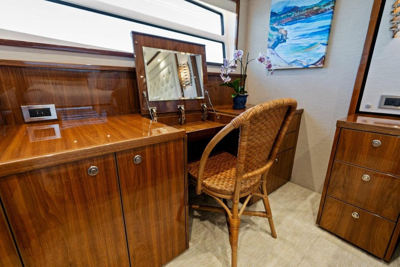 a chair sits in a kitchen aboard MANA Yacht for Sale