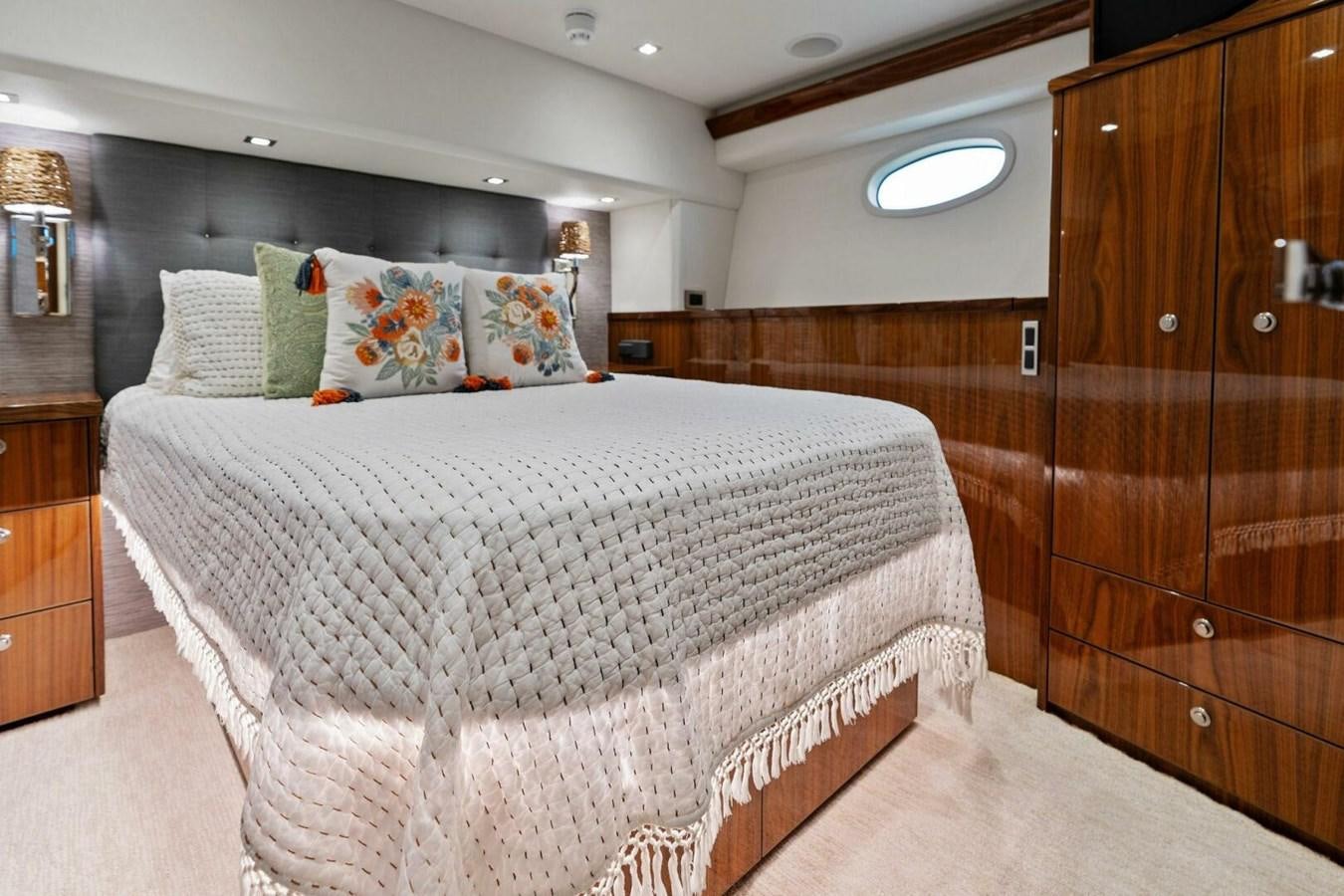 a bed in a room aboard MANA Yacht for Sale