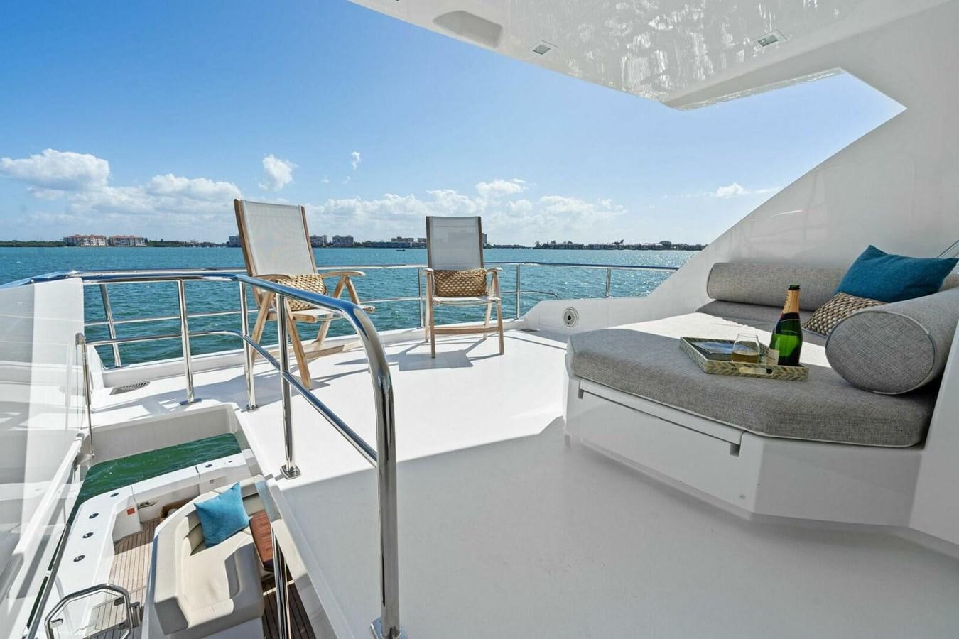 a glass bottle on a boat aboard MANA Yacht for Sale