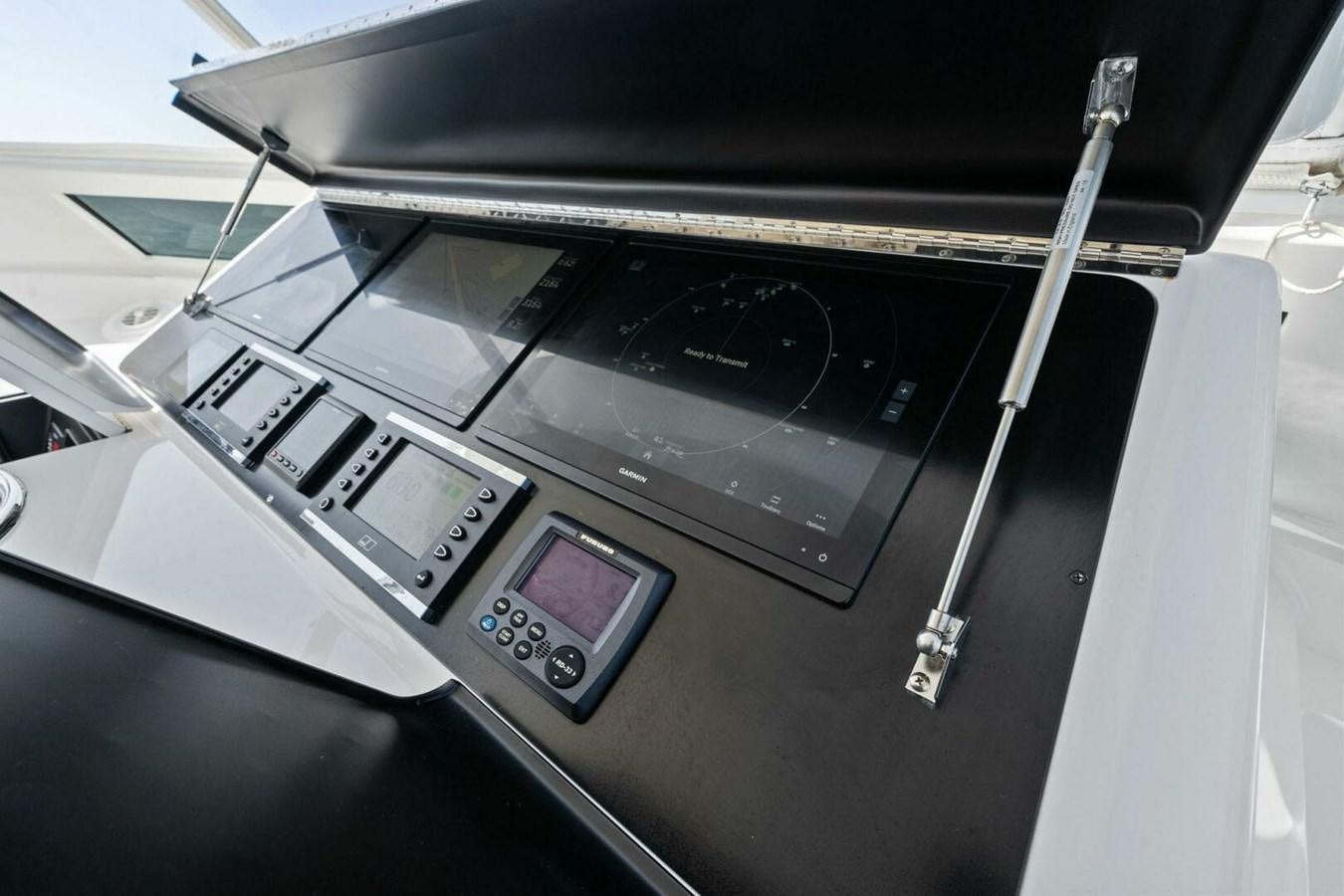 a machine with a screen aboard MANA Yacht for Sale