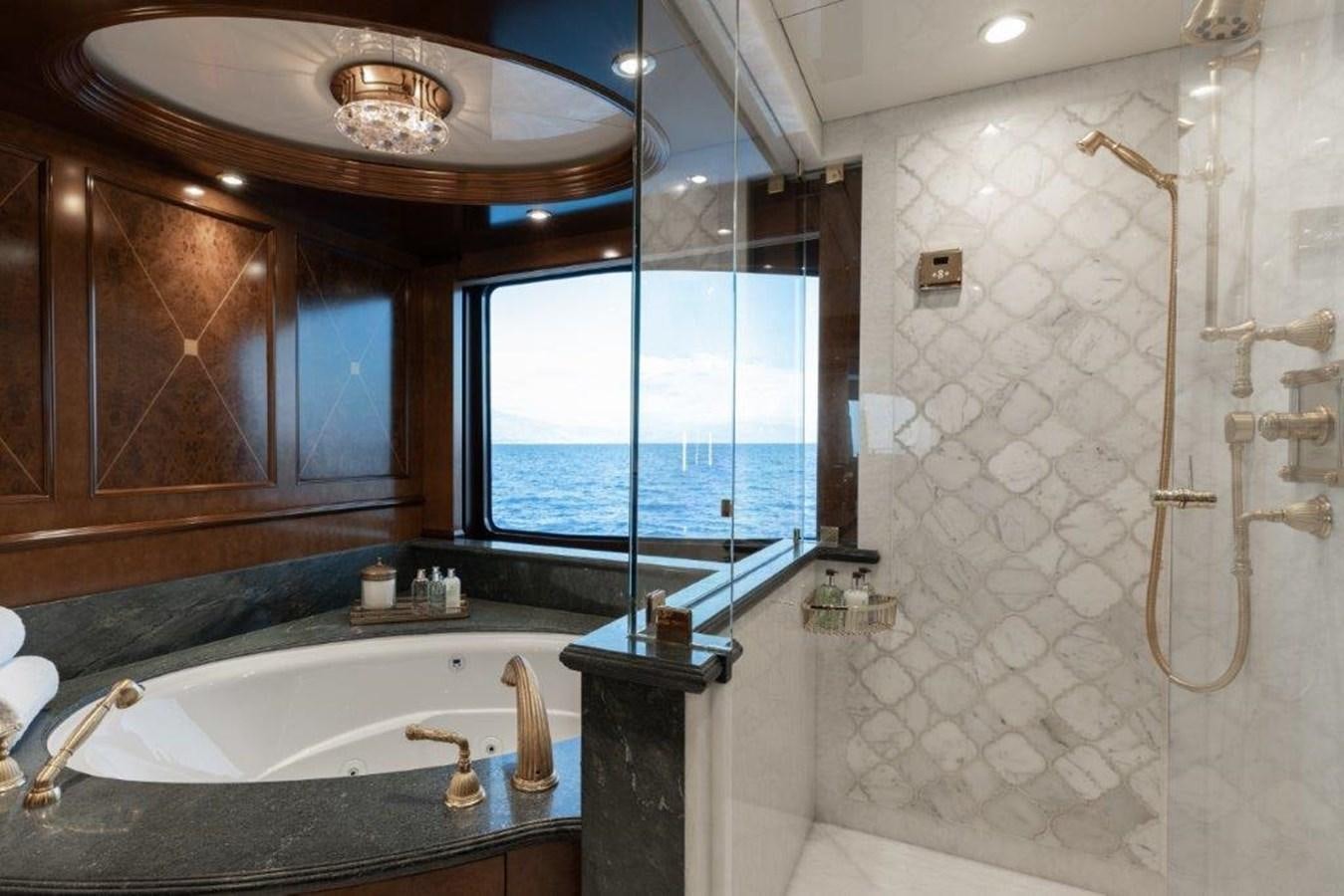 a bathroom with a large tub aboard IRON BLONDE Yacht for Sale
