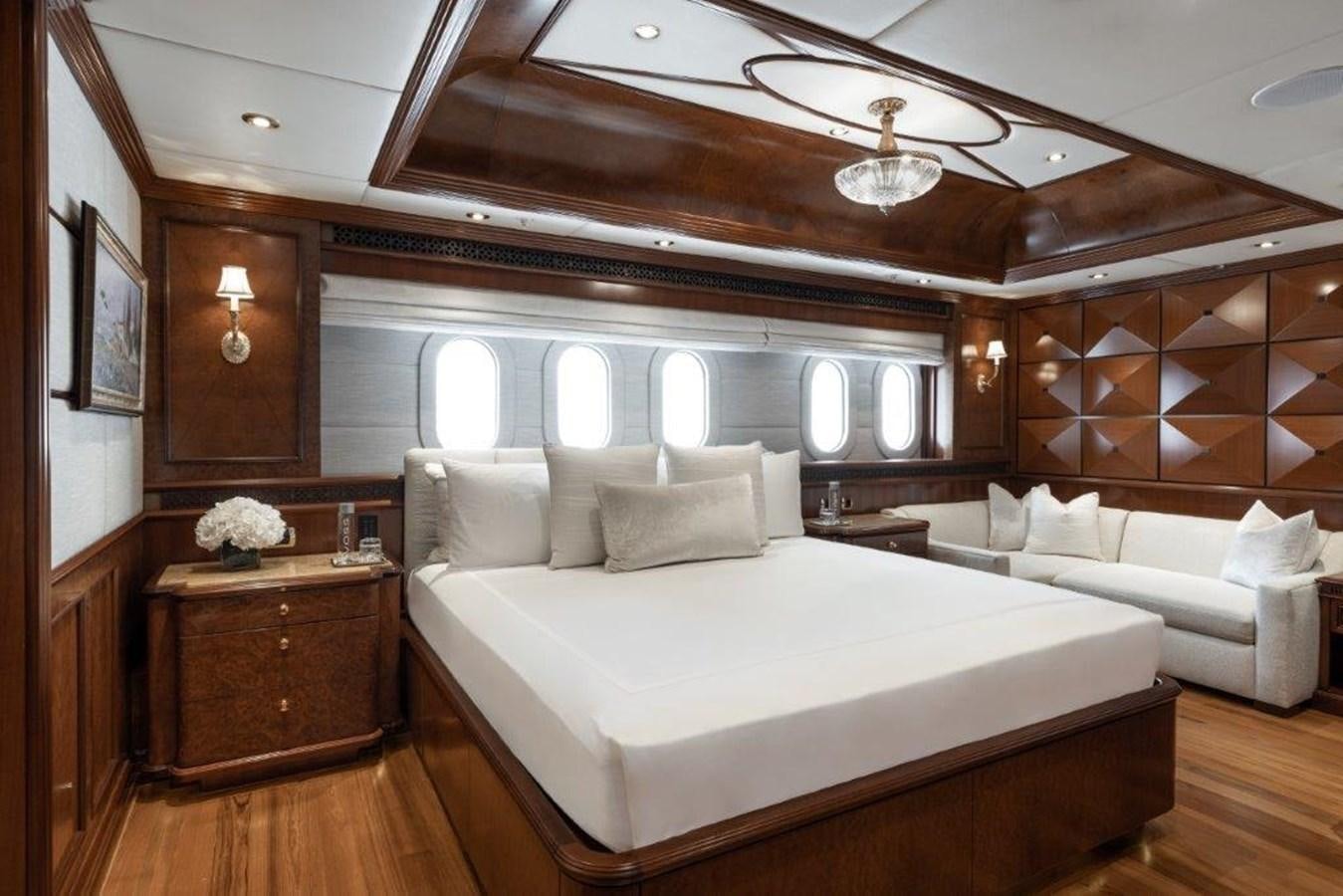 a large bed in a room aboard IRON BLONDE Yacht for Sale