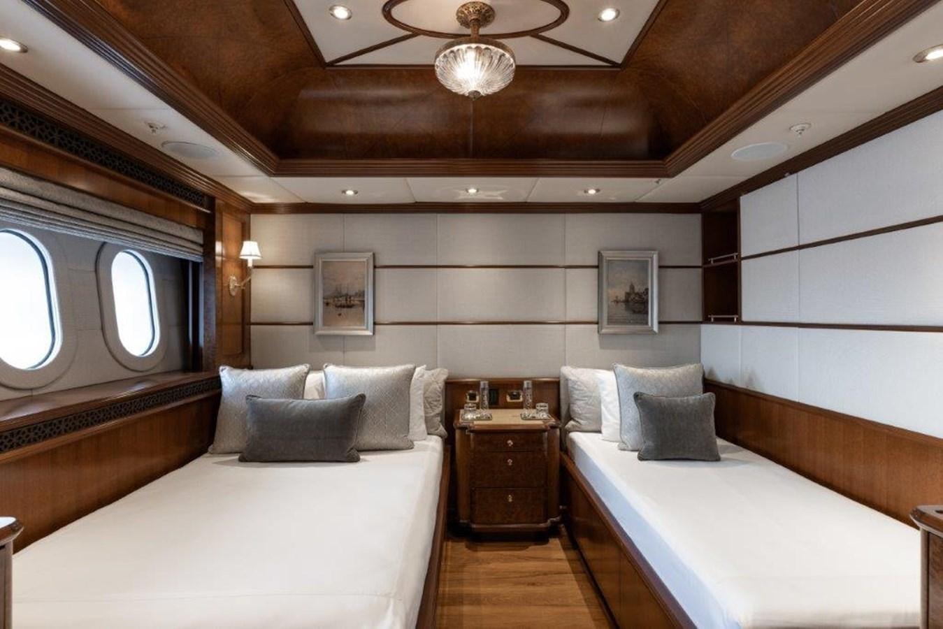 a room with two beds aboard IRON BLONDE Yacht for Sale