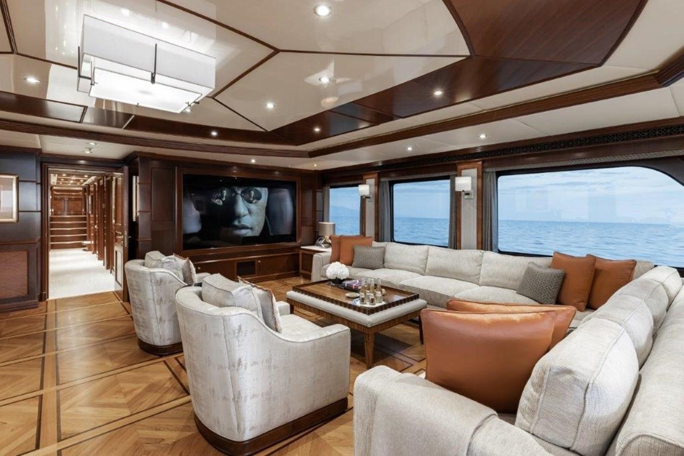 a living room with a large television aboard IRON BLONDE Yacht for Sale