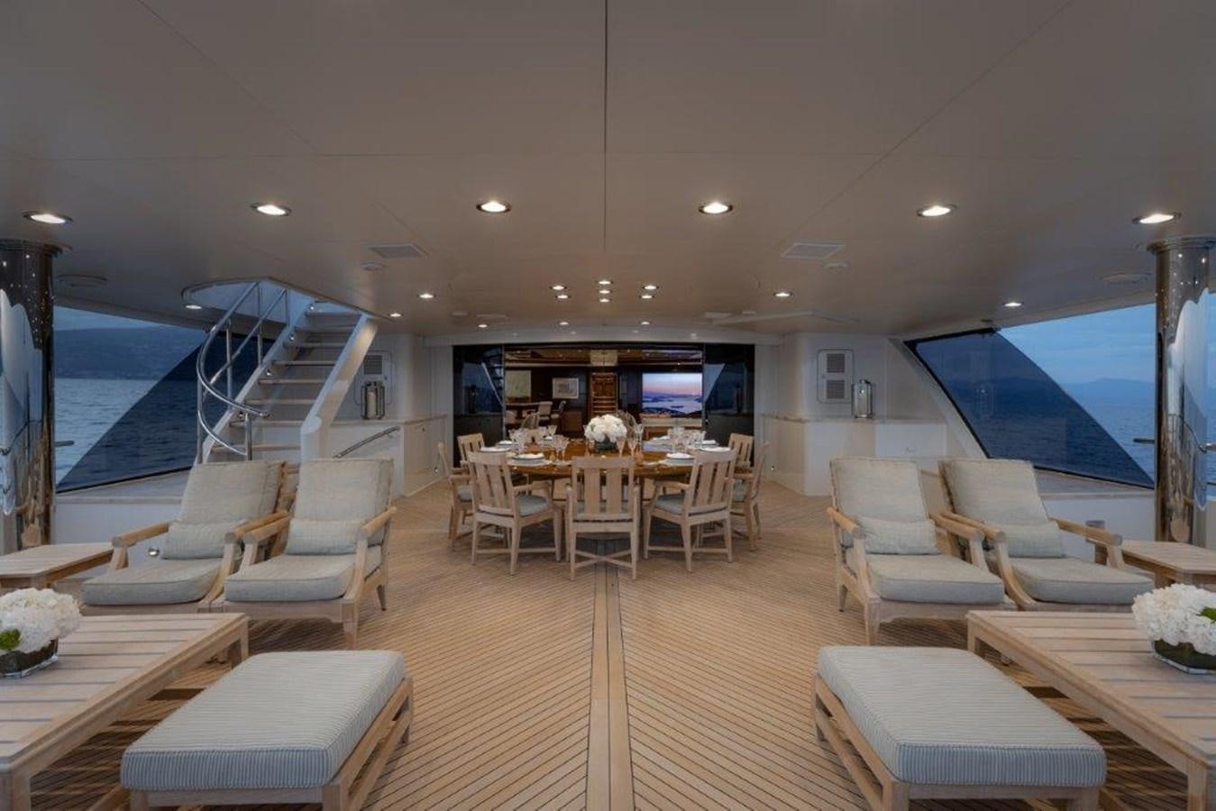 a large modern looking room with a pool aboard IRON BLONDE Yacht for Sale
