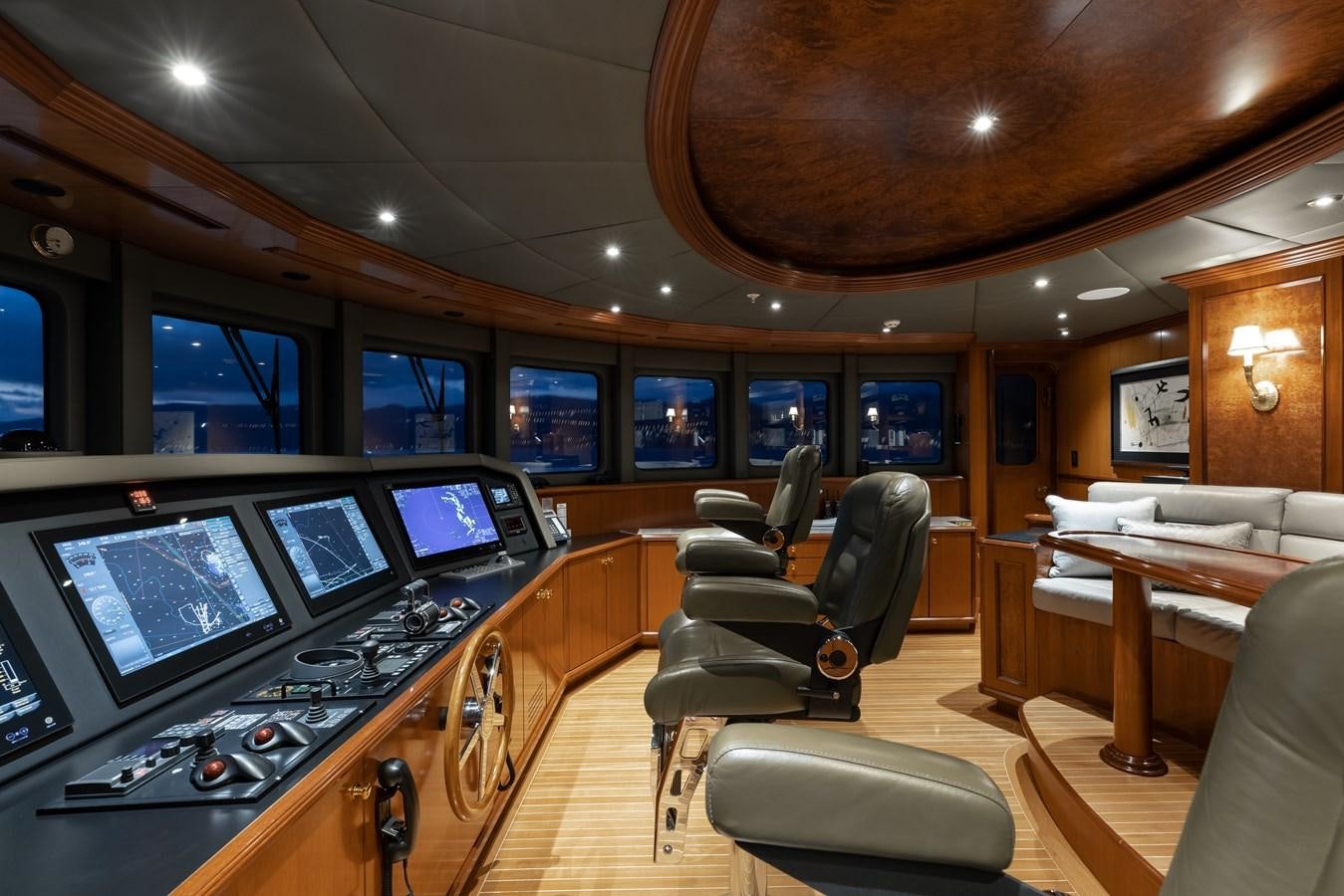 a room with a table and chairs aboard IRON BLONDE Yacht for Sale