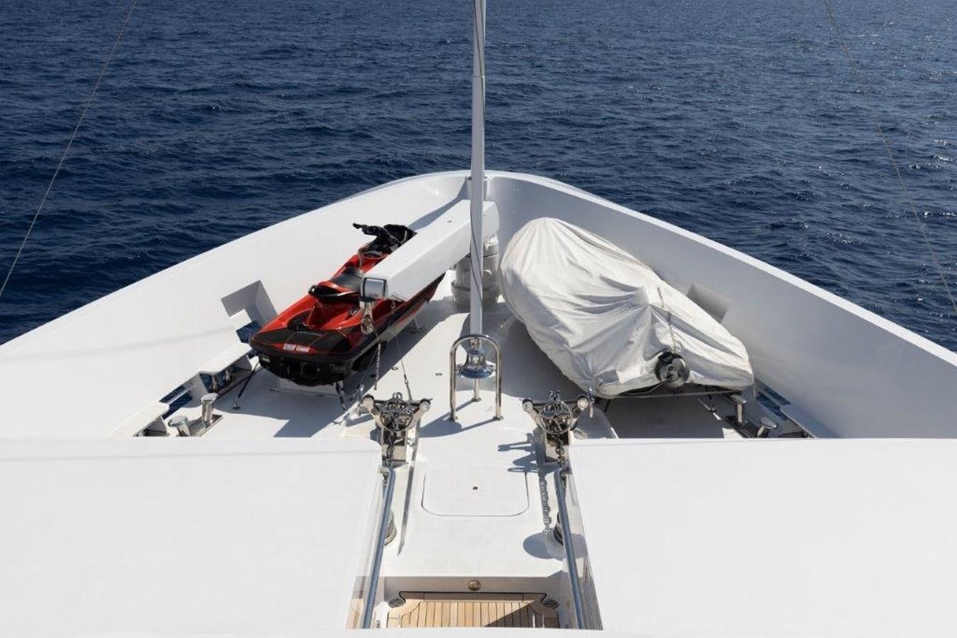 a boat with a white canopy aboard IRON BLONDE Yacht for Sale