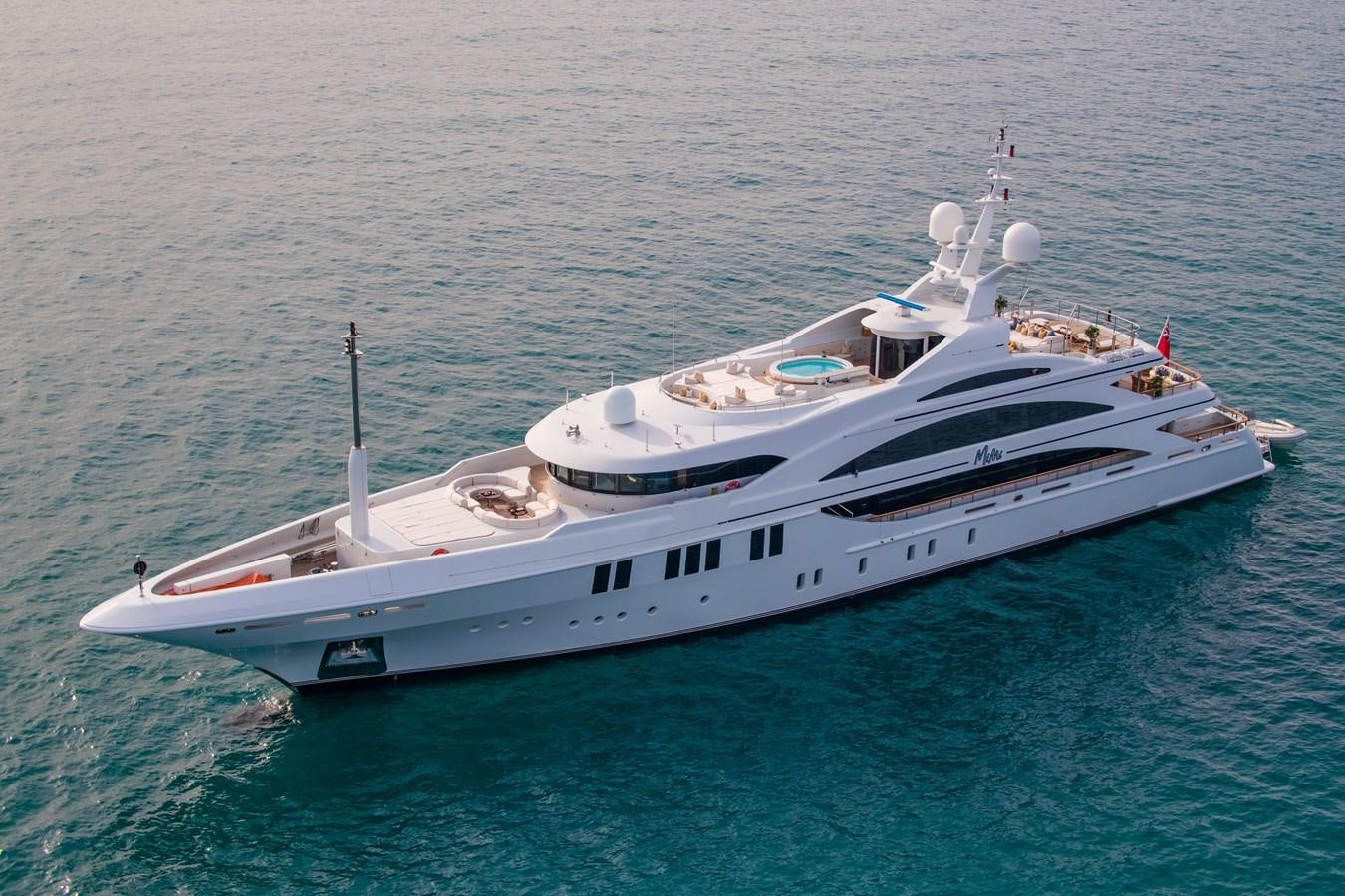a white yacht in the water aboard LA BLANCA Yacht for Sale
