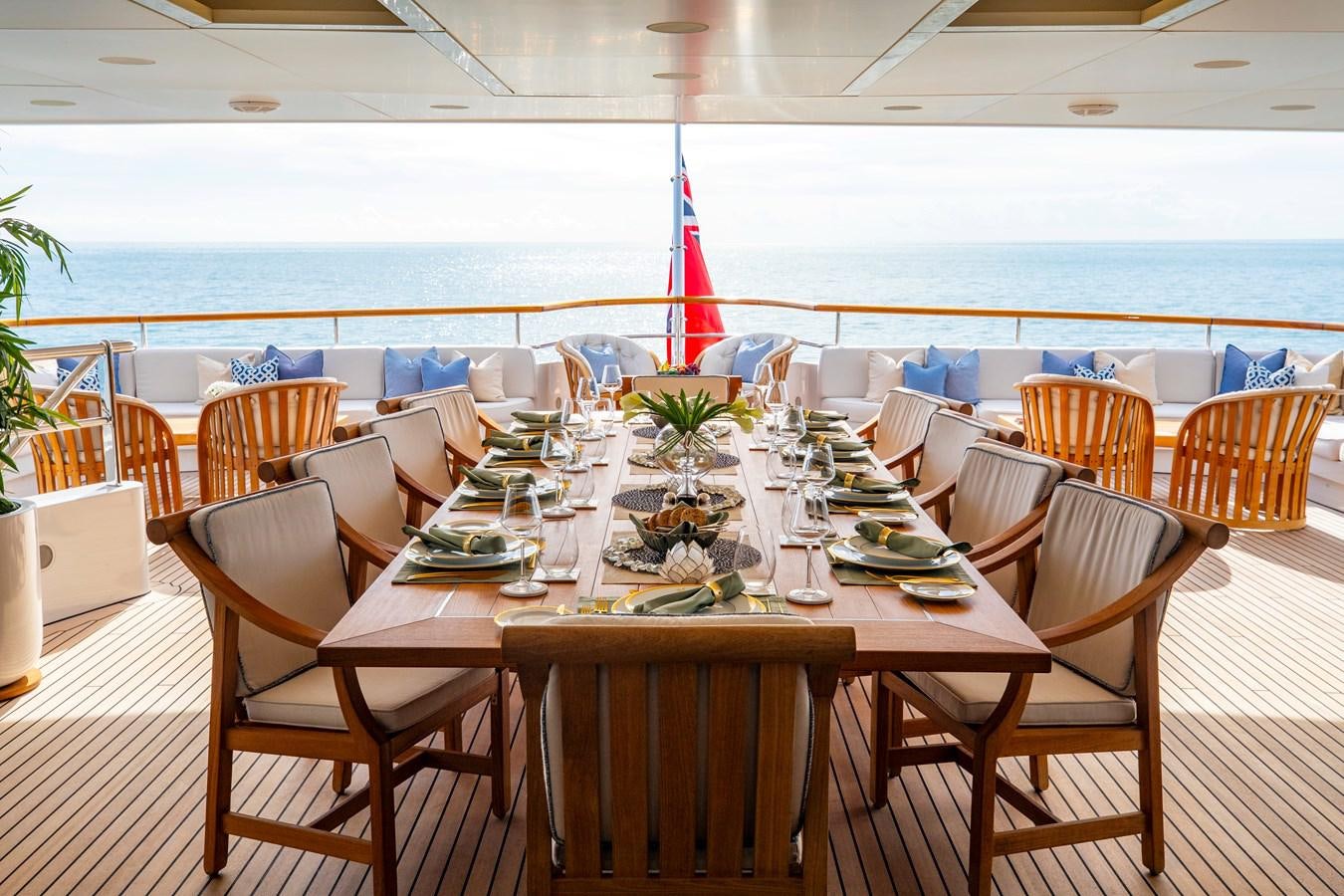 a table set for a meal aboard LA BLANCA Yacht for Sale