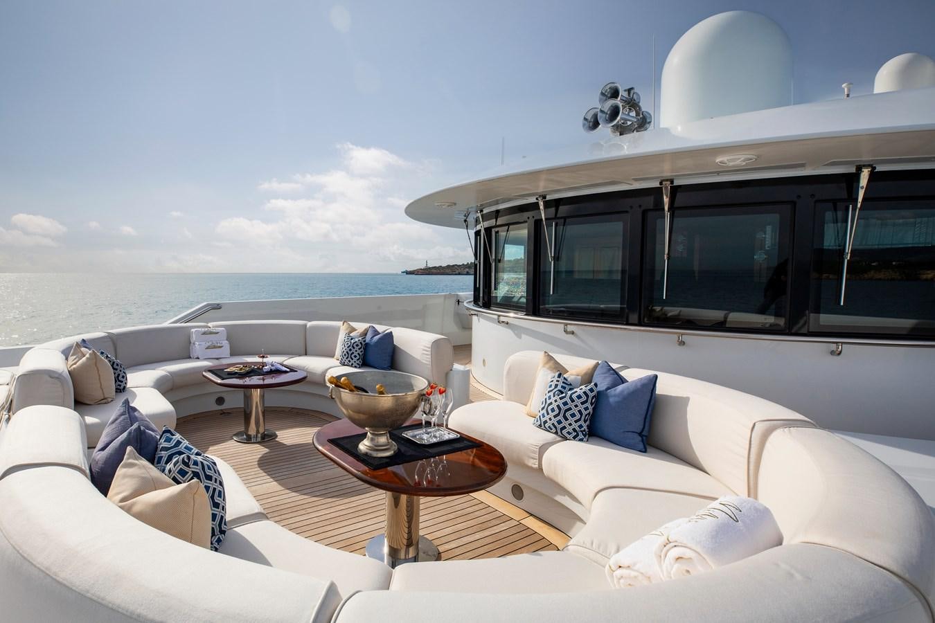 a living room with a large window aboard LA BLANCA Yacht for Sale