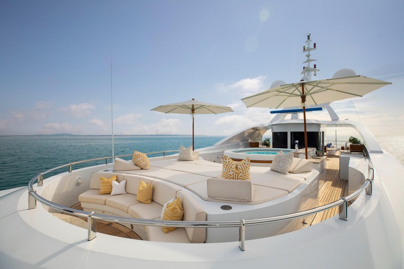 a lounge chair on a beach aboard LA BLANCA Yacht for Sale