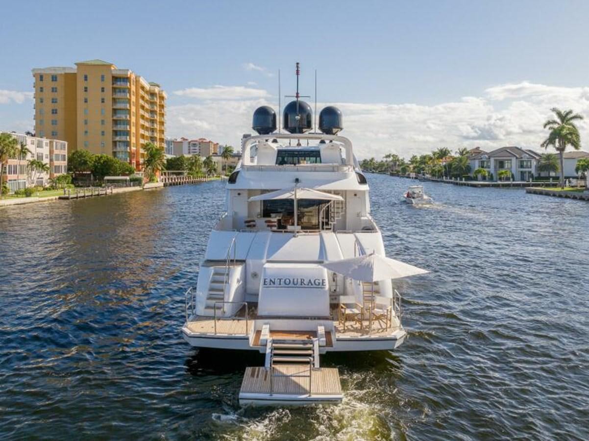 a large white boat in the water aboard ENTOURAGE Yacht for Sale