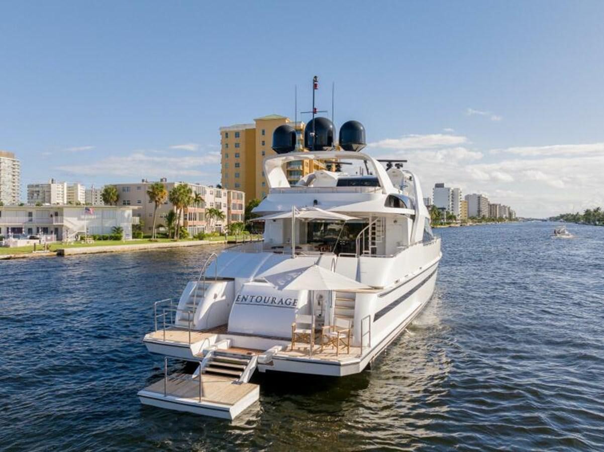 a large white boat on the water aboard ENTOURAGE Yacht for Sale