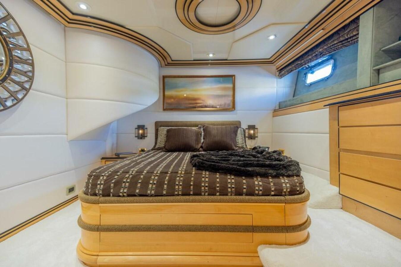 a bed in a room aboard ENTOURAGE Yacht for Sale