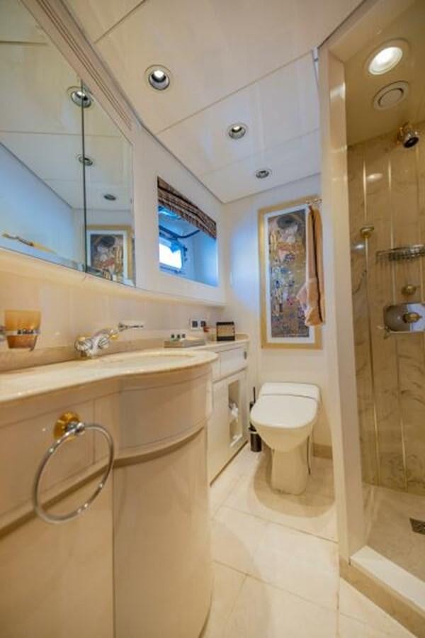 a bathroom with a glass shower aboard ENTOURAGE Yacht for Sale