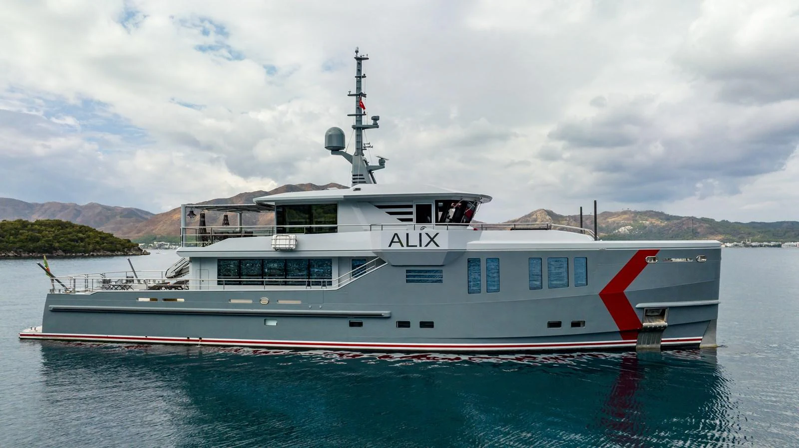a large white boat in the water aboard K584 Yacht for Sale
