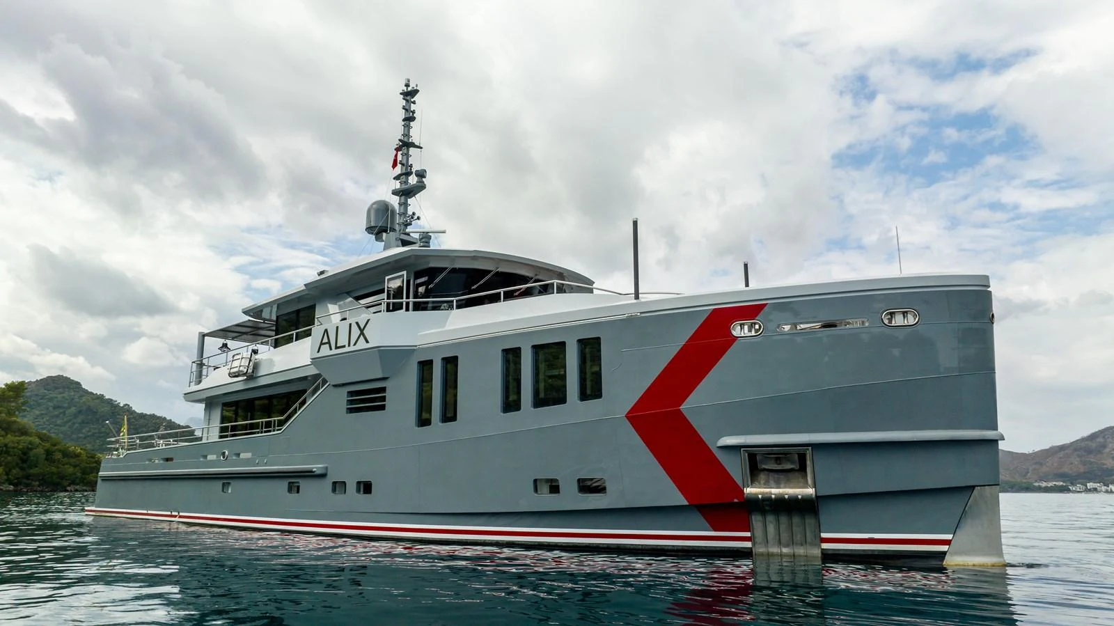 a large white boat on the water aboard K584 Yacht for Sale