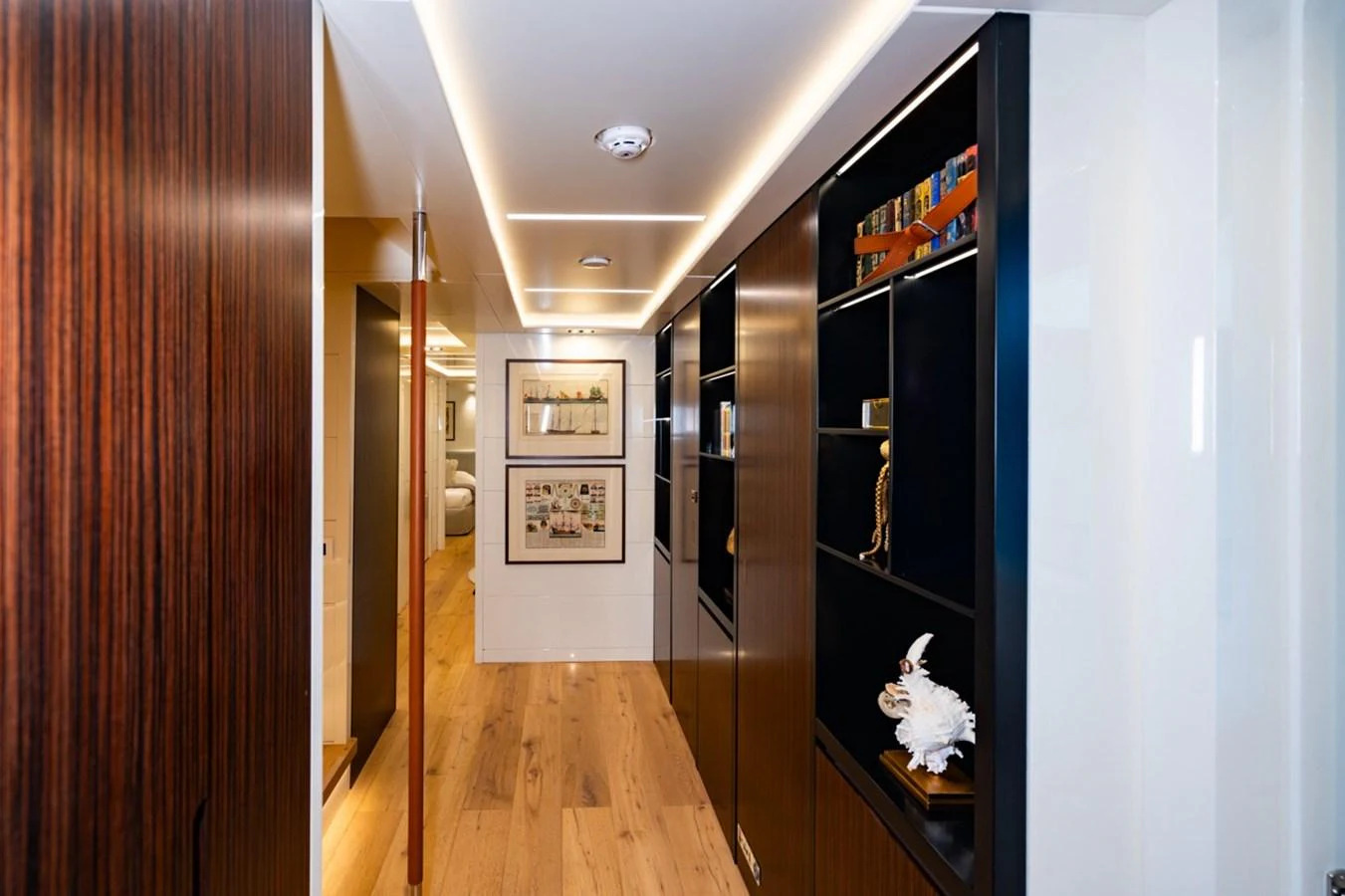 a hallway with a cat on the stairs aboard K584 Yacht for Sale