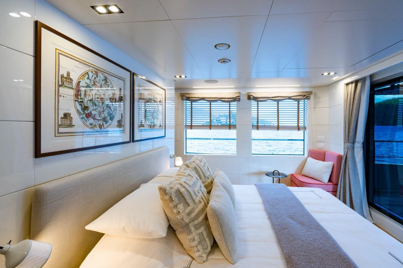 a room with a bed and a chair aboard K584 Yacht for Sale