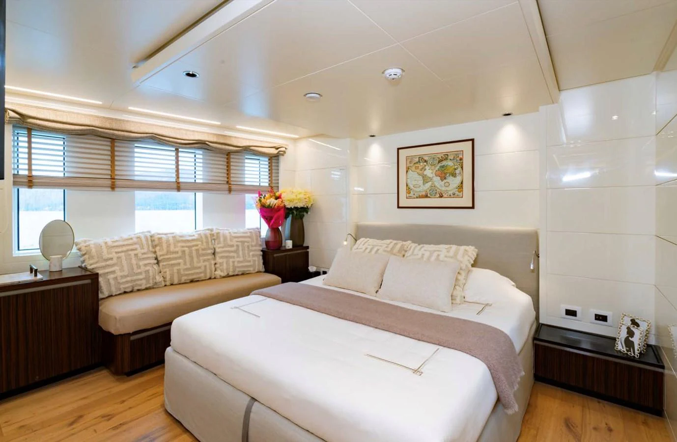 a bedroom with a bed and a couch aboard K584 Yacht for Sale