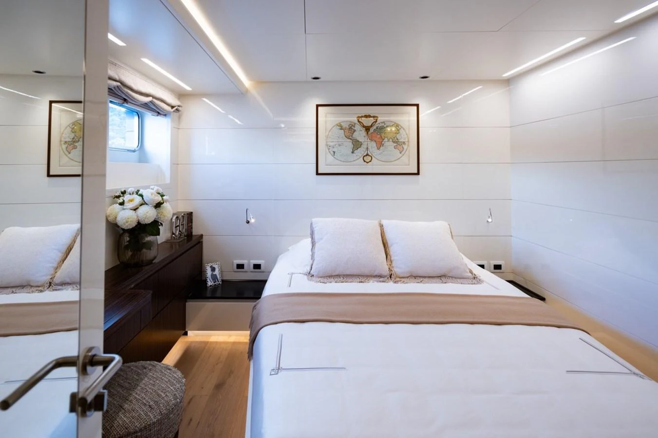 a bed with white sheets aboard K584 Yacht for Sale