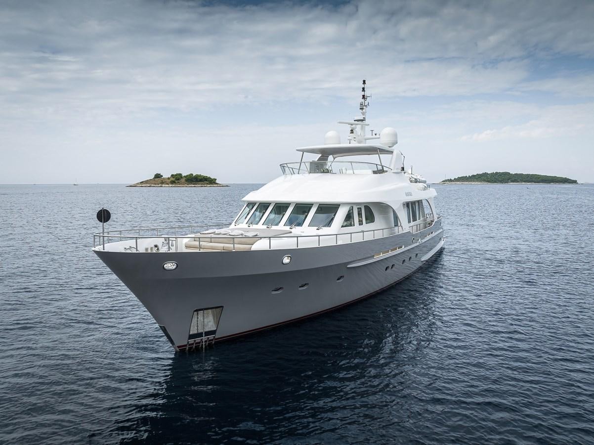 a white boat on the water aboard NASHIRA Yacht for Sale