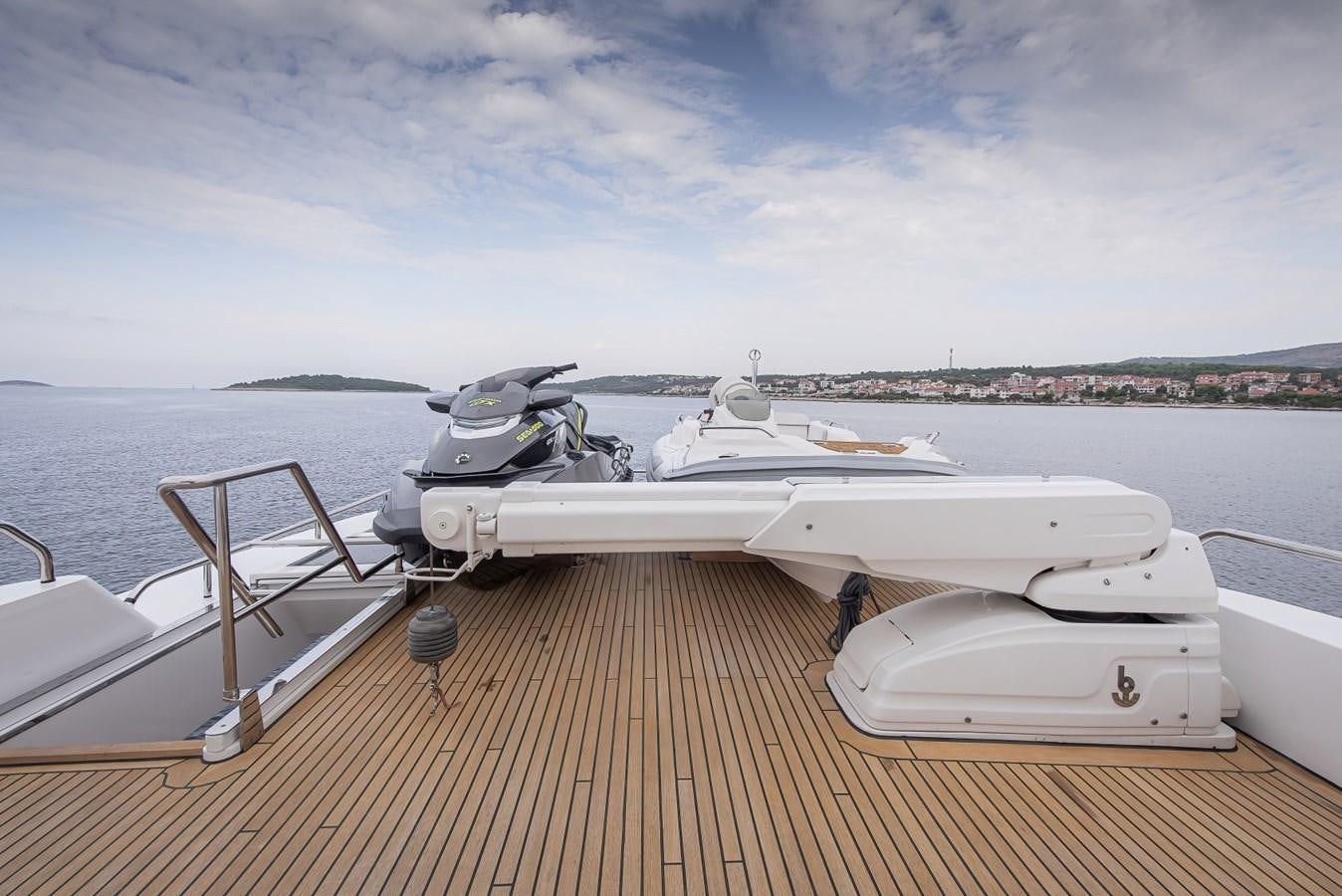 a row of boats on a deck aboard NASHIRA Yacht for Sale