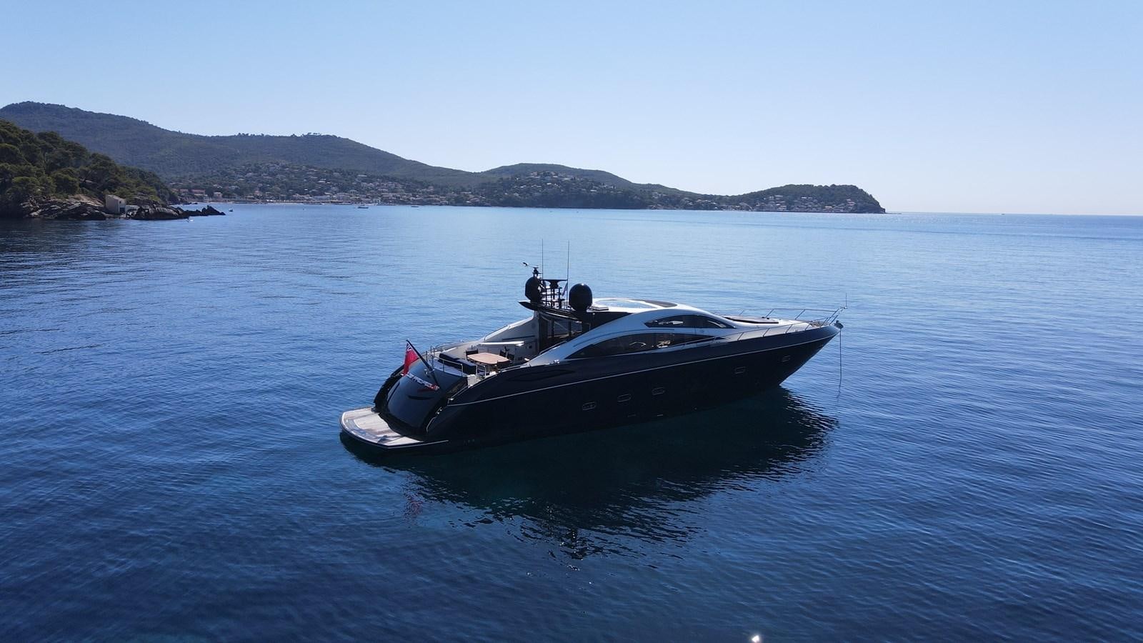 a boat in the water aboard LOW PROFILE Yacht for Sale