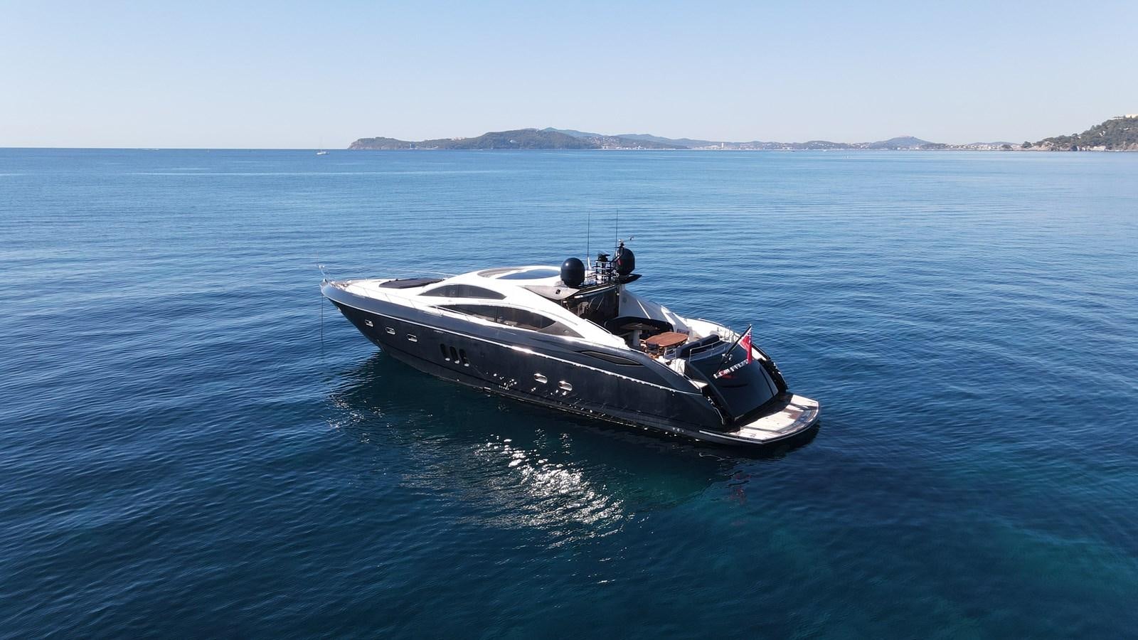 a boat in the water aboard LOW PROFILE Yacht for Sale