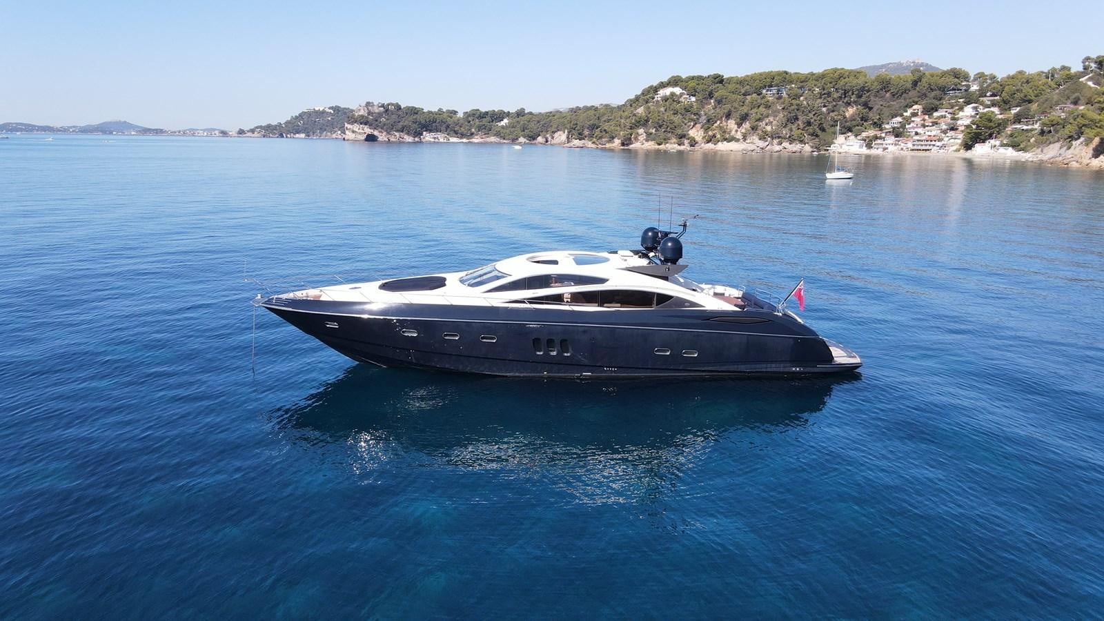 a boat in the water aboard LOW PROFILE Yacht for Sale
