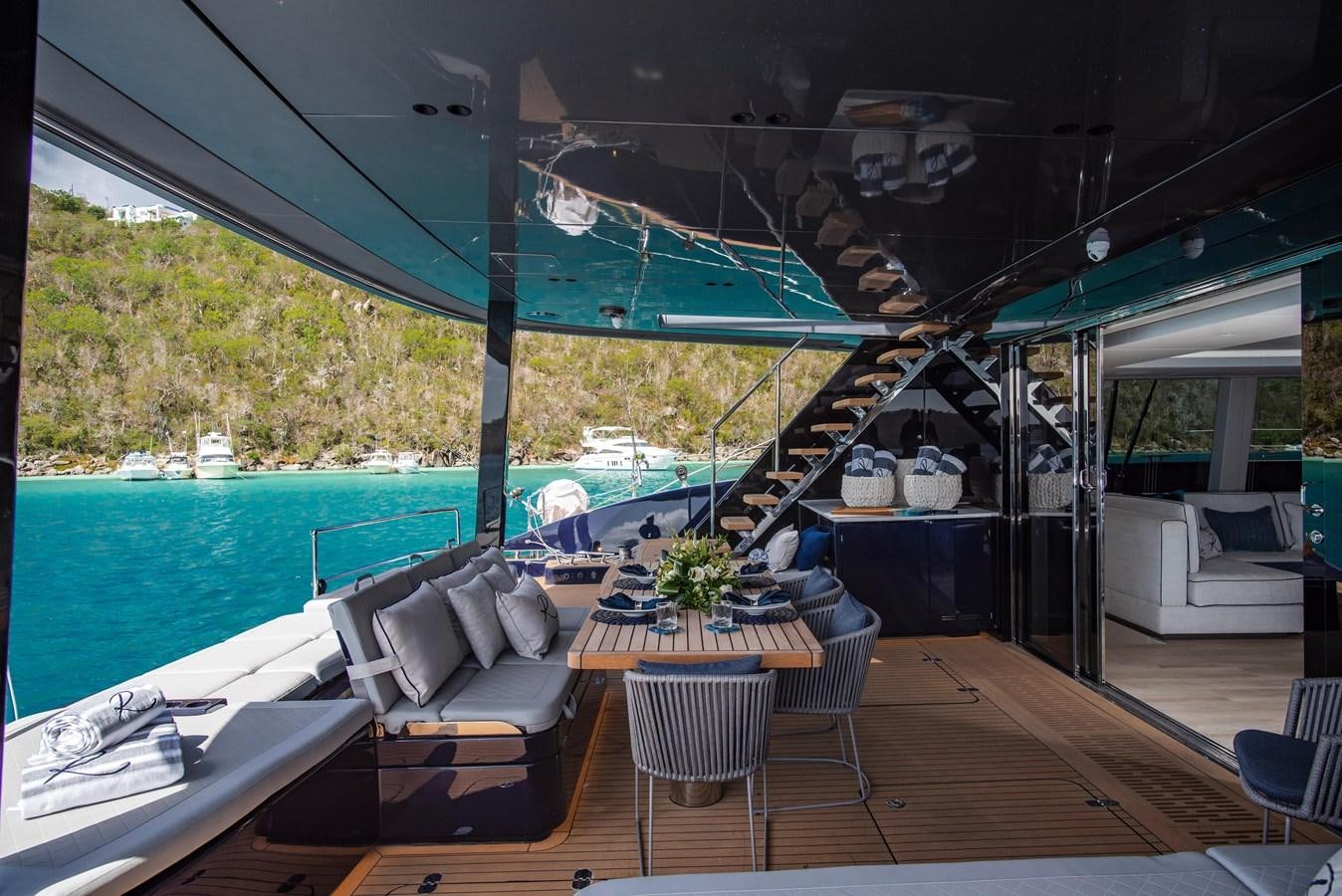 a patio with a pool aboard 2022 SUNREEF 80 SAILING Yacht for Sale