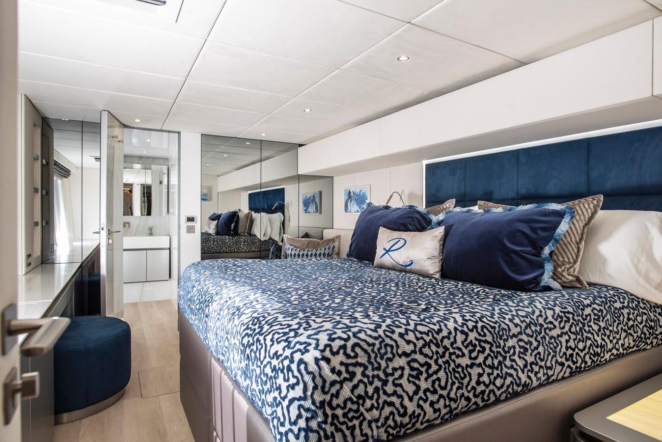 a person lying on a bed aboard 2022 SUNREEF 80 SAILING Yacht for Sale