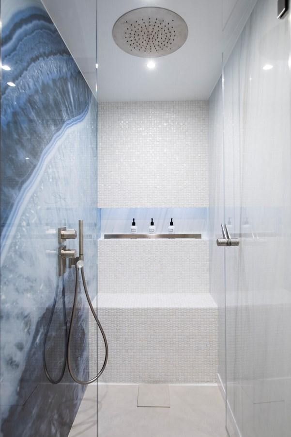 a bathroom with a shower unit aboard 2022 SUNREEF 80 SAILING Yacht for Sale