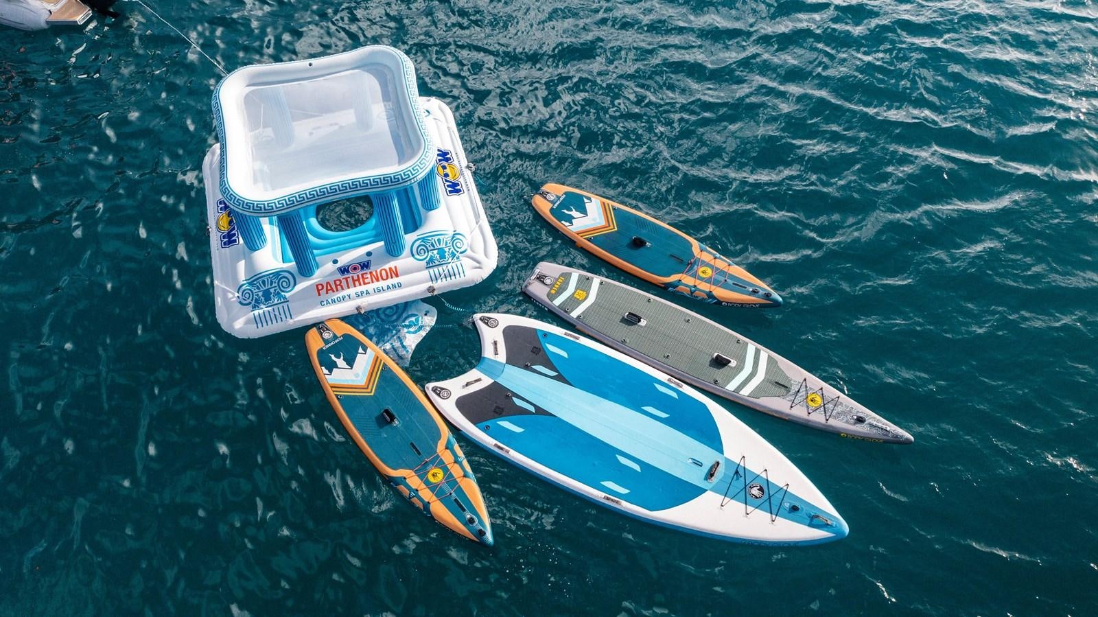 a couple of kayaks on a body of water aboard 2022 SUNREEF 80 SAILING Yacht for Sale