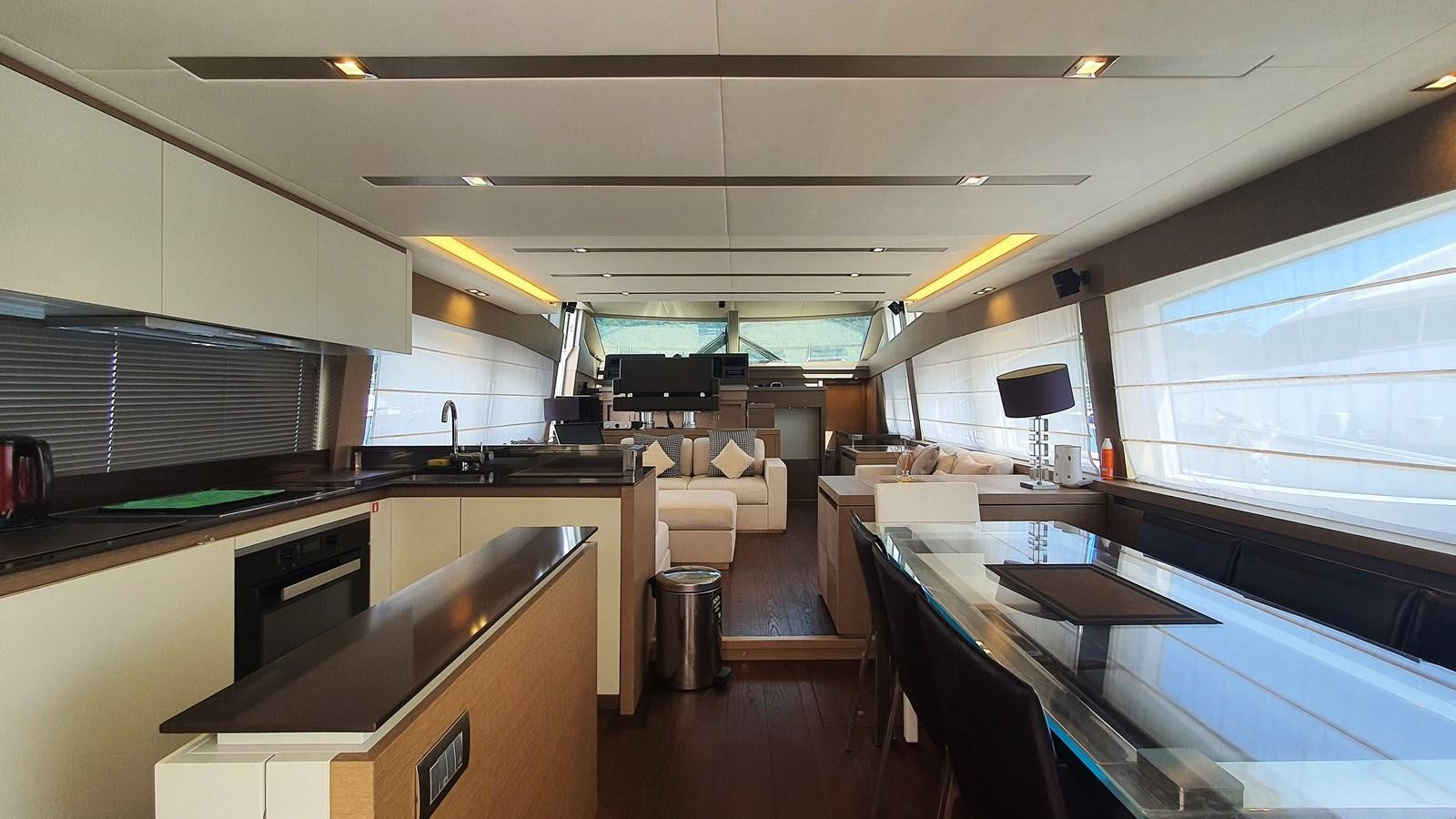 a large kitchen with a large window aboard NEW FISH Yacht for Sale