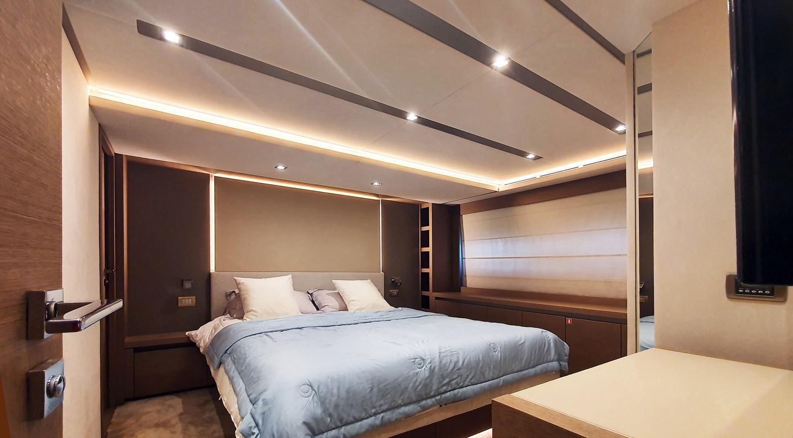 a room with two beds aboard NEW FISH Yacht for Sale