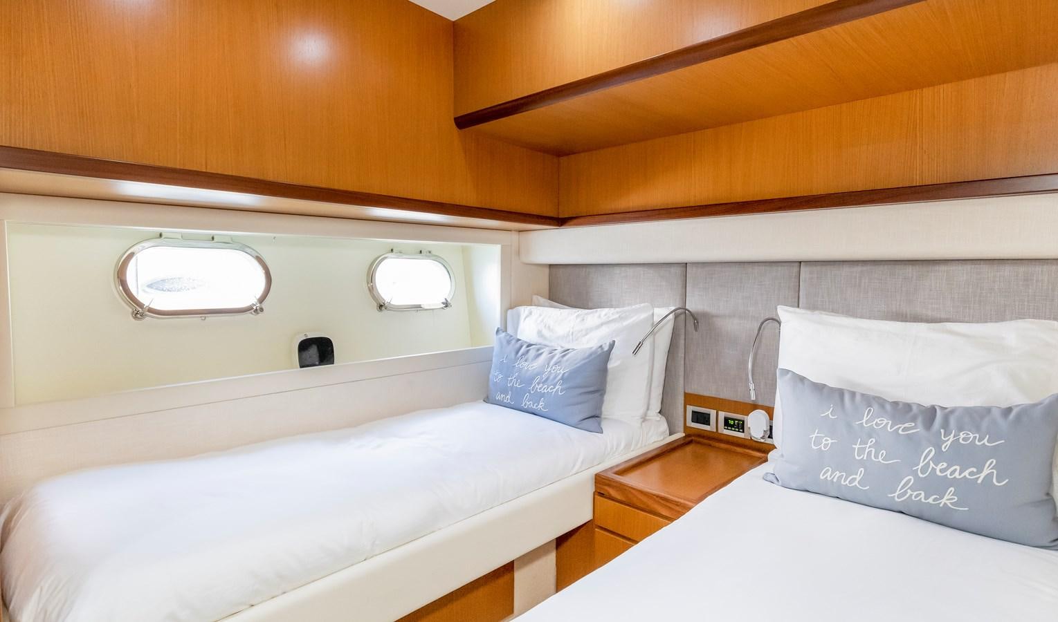 a room with two beds aboard HOPE Yacht for Sale