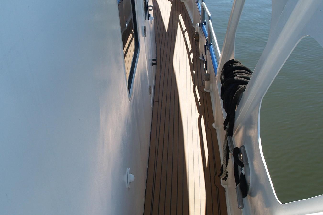 a car on the road aboard PATRICIA D Yacht for Sale