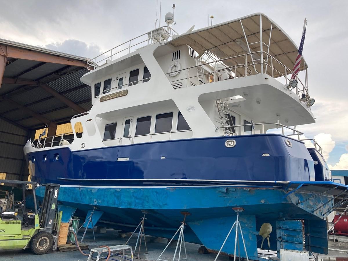 a large white boat aboard PATRICIA D Yacht for Sale