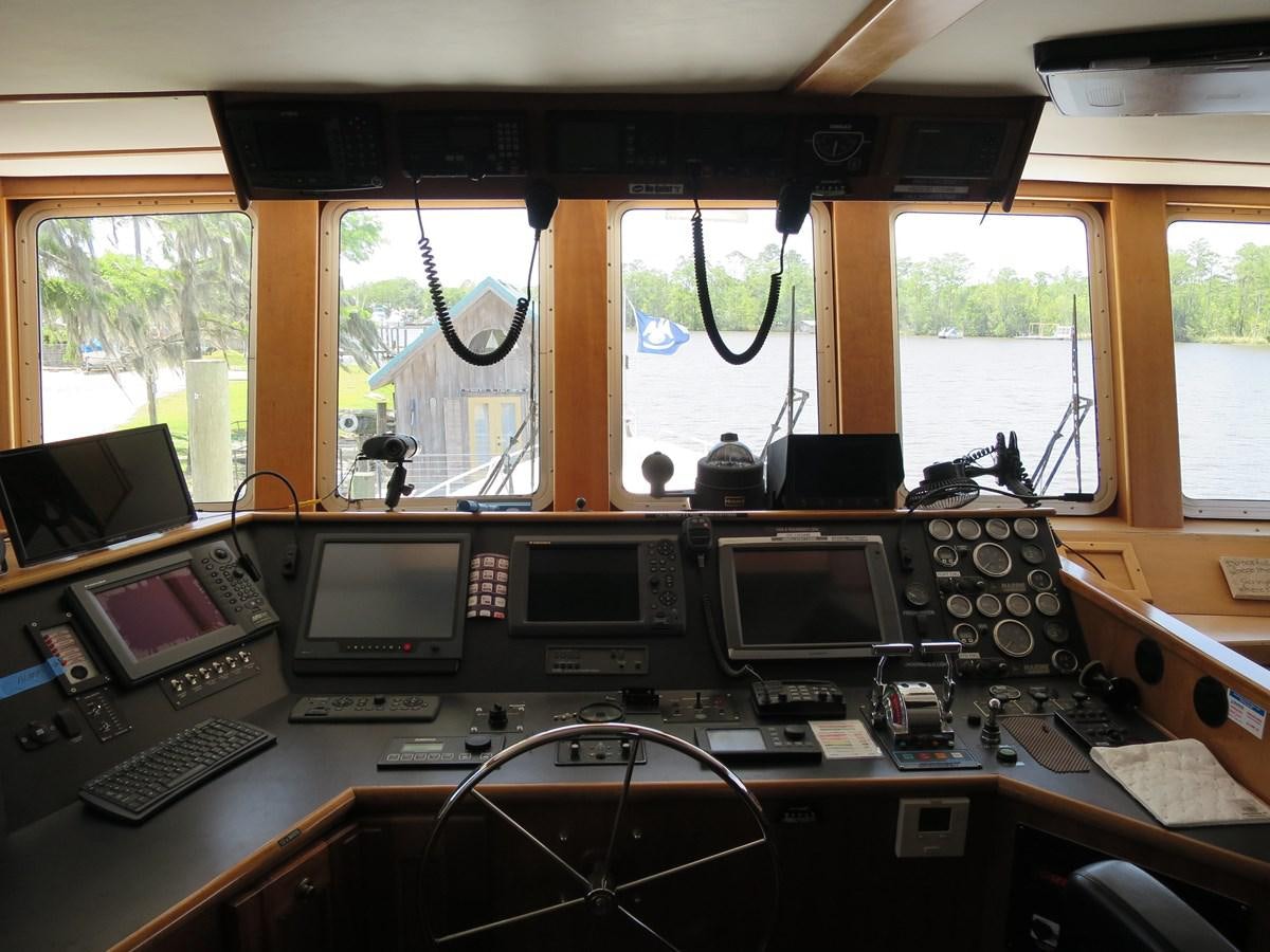 a room with many computers and other objects on it aboard PATRICIA D Yacht for Sale